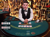 A screenshot of the Ultimate Texas Hold'em game from Evolution